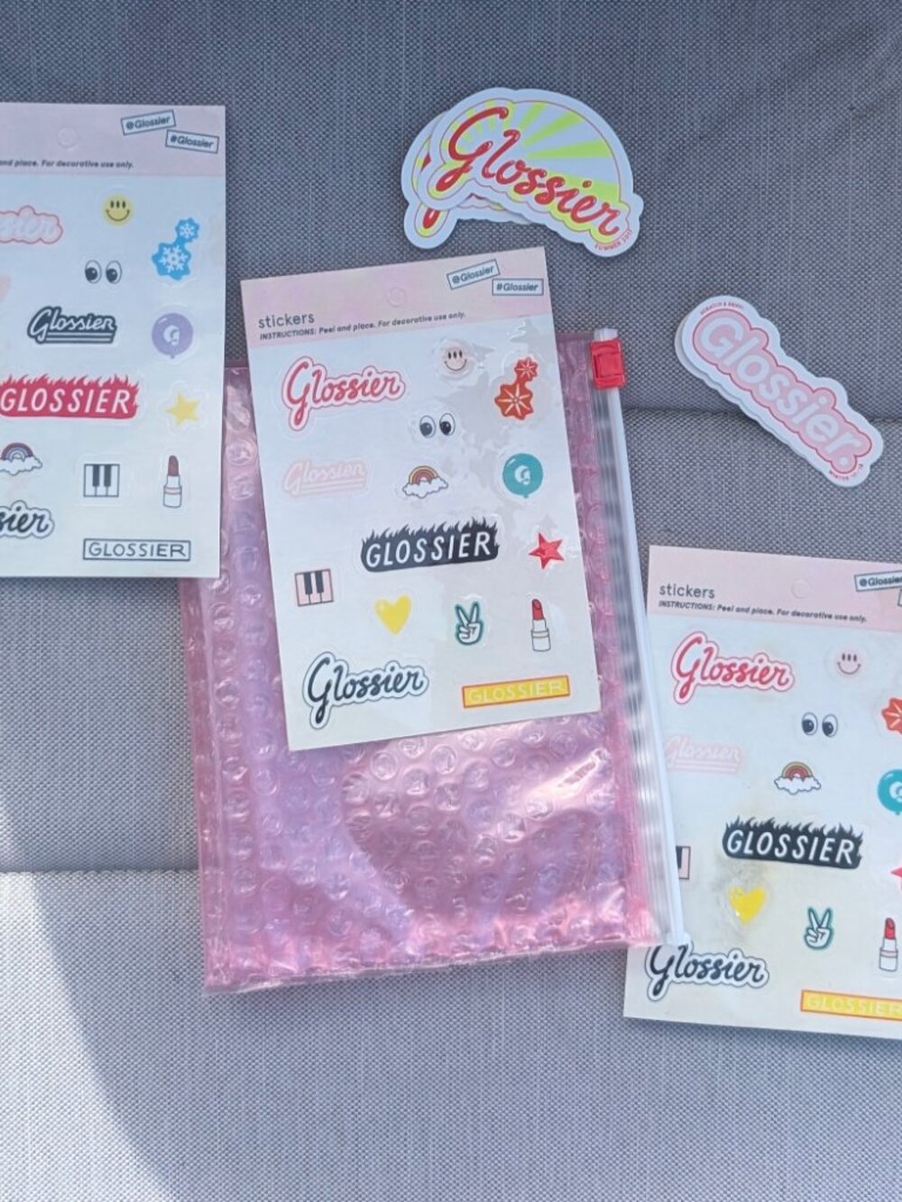 Glossier Pouch & Sticker Bundle - Picture 2 of 2
